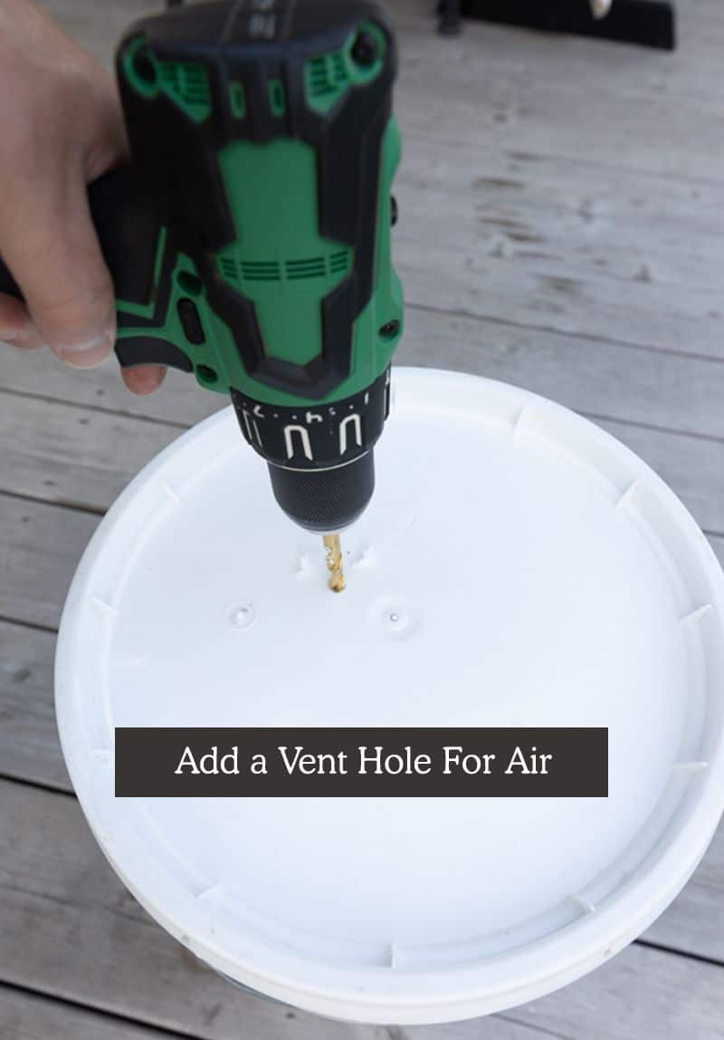 chicken waterer bucket - drilling a vent hole for air at the buttom of the bucket