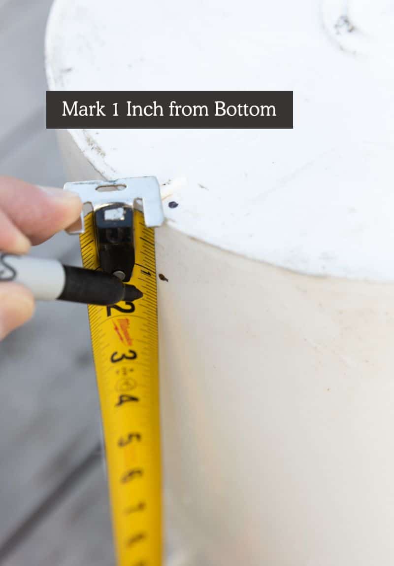 easy homemade chicken feeder diy - marking 1 inch from bottom