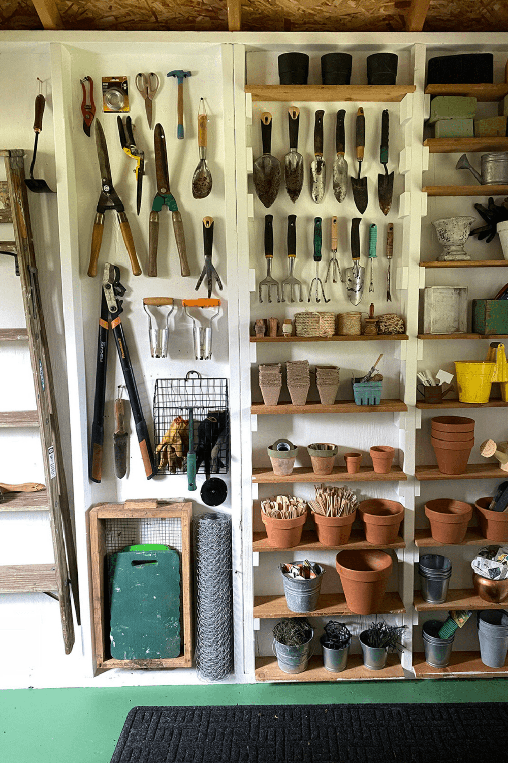 organized garden tools and pots 