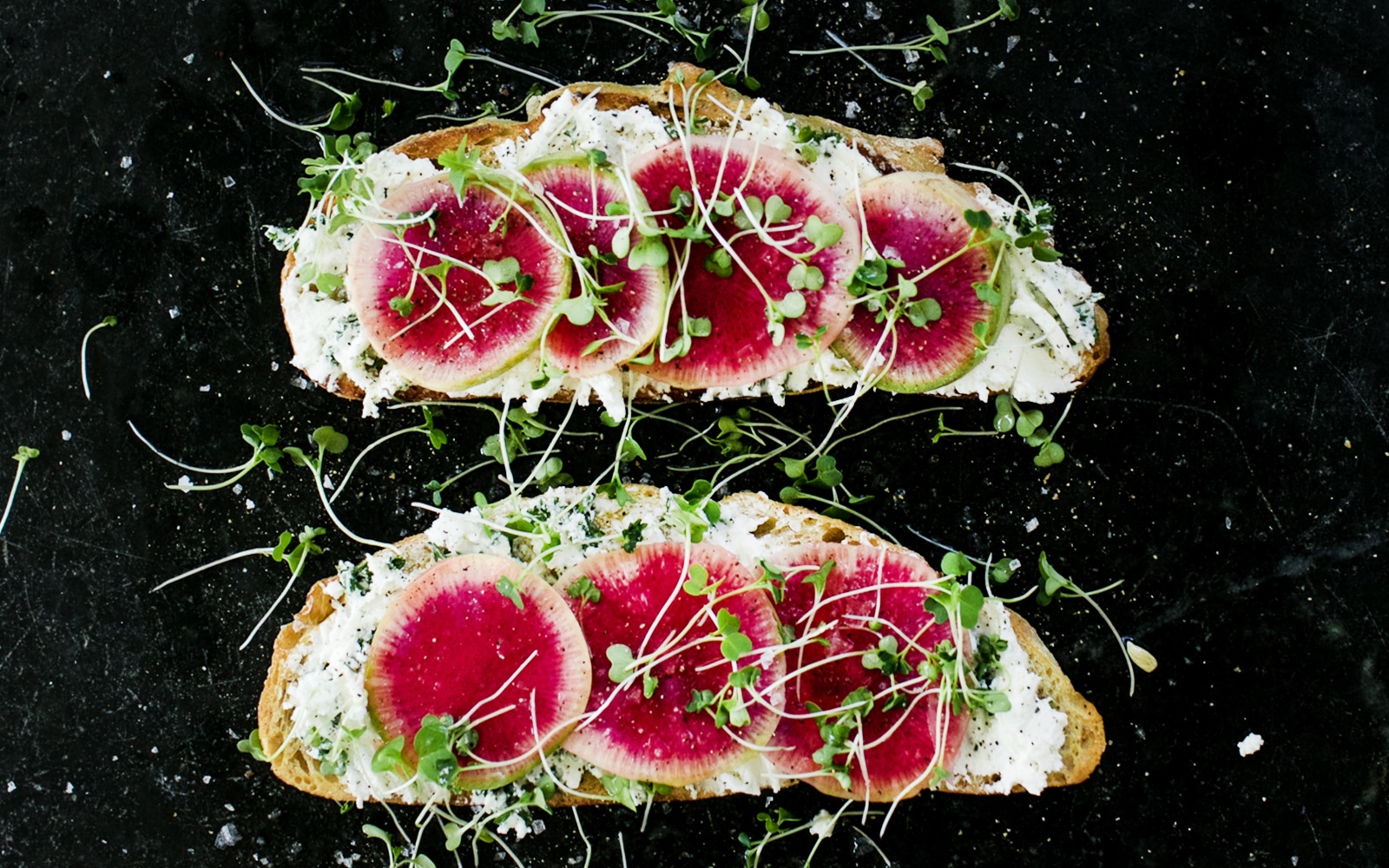 A Simple Spring Toast Recipe of Watermelon Radish and Herbed Goat Cheese. Get the full recipe on The Fresh Exchange.